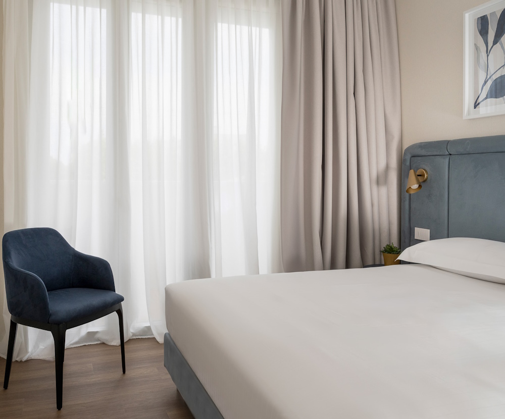 <title>Camere e Suite di design | Parioli Hotel Rimini</title>
