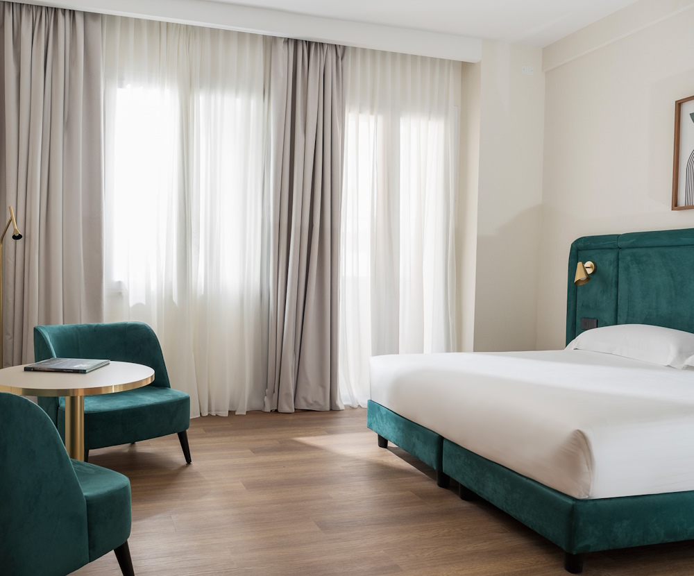 <title>Camere e Suite di design | Parioli Hotel Rimini</title>